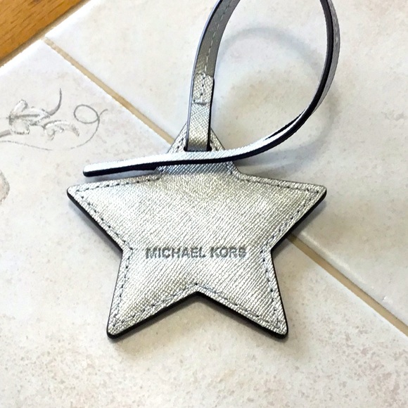 Genuine MK hangtag. NWOT